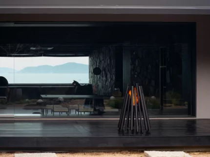 EcoSmart Fire Stix Fire Pit adds contemporary style and clean-burning ethanol warmth to a private residence outdoor setting.