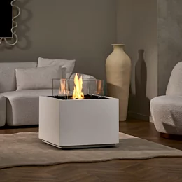 EcoSmart Fire’s Sidecar 24 ethanol fire table anchors an indoor lounge with fluid-concrete finish, delivering modern designer heat for residential entertaining.