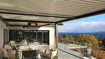 Heatscope Heater Spot 2800W Radiant Heater wall‑mounted at Residential Space, outdoor electric infrared heating.