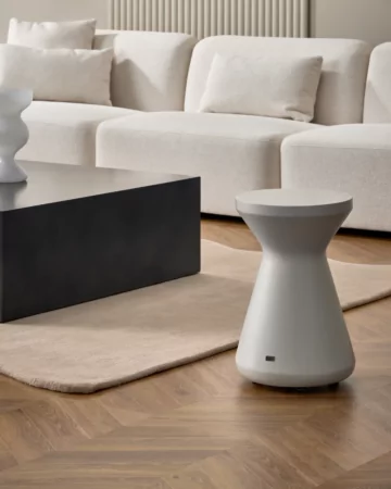 Blinde Design Solo Stool adds bone concrete seating to a private residence living room, delivering modern designer furniture flair.