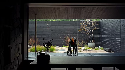 EcoSmart Fire Stix Fire Pit brings contemporary outdoor ambience and clean-burning ethanol warmth to a private residence.