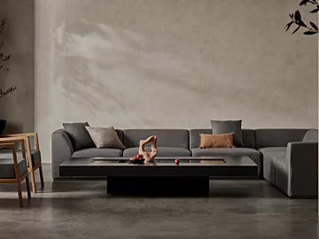 EcoSmart Fire Gin 90 Low Fire Table adds ventless bioethanol warmth to a concrete centrepiece in a cosy living room.