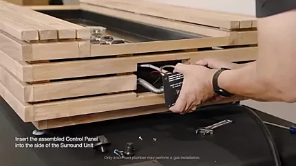 How to Assemble and Operate your Gas Fireplace? 12 Inserting the assembled control panel into the surroundunit